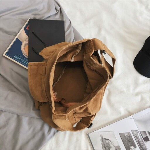 Sumleno Bohemian Hipster Hobo bag with a close-up of the canvas material and stitching.