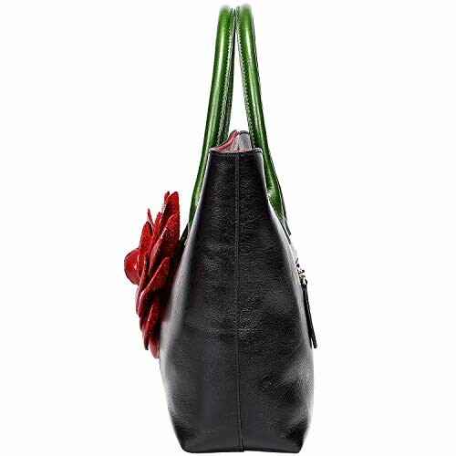 Side view of black leather tote bag with red flower decoration